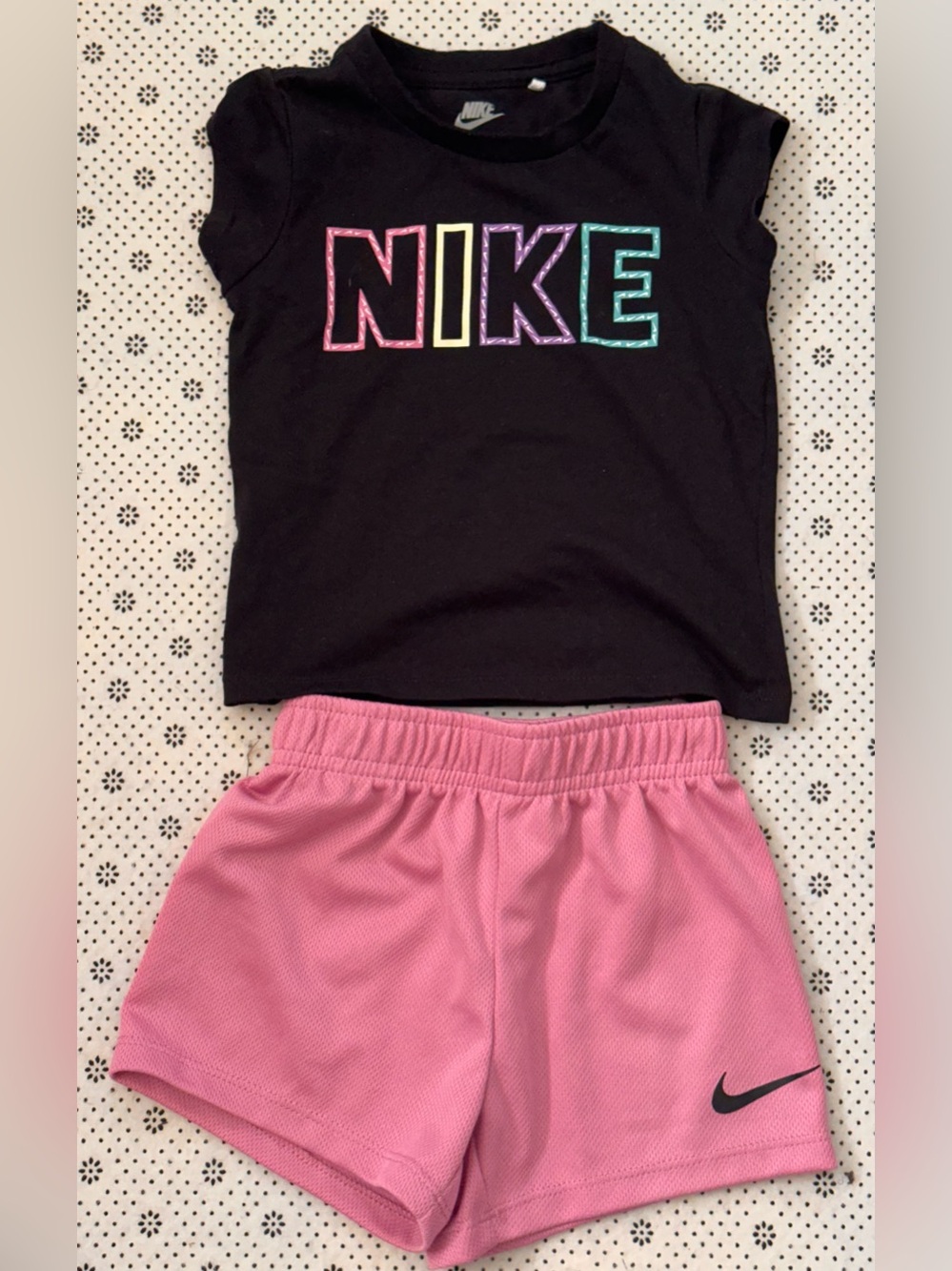 Nike Black Tee with Multicolor Logo and Pink Athletic Shorts